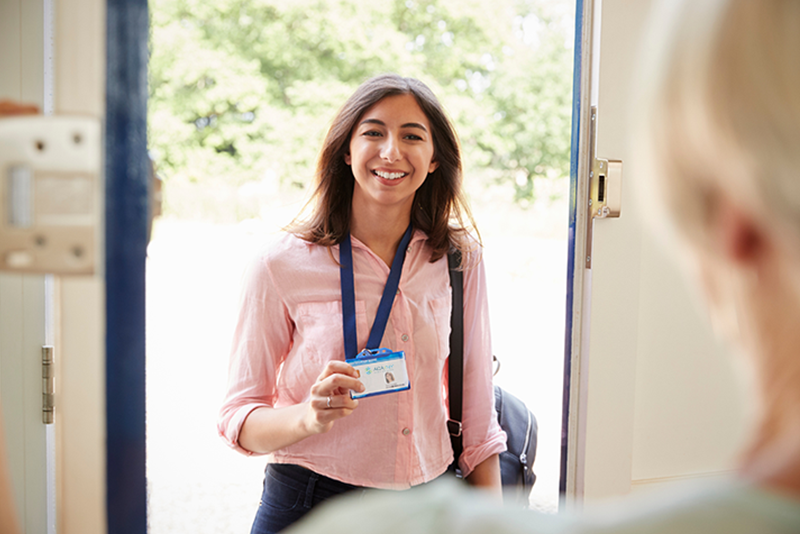 CMOR: A woman appears at the door showing her ACANY badge smiling.