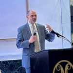 Nick Cappoletti delivers his keynote address.